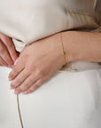 Empower drop bracelet gold