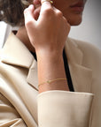 Le Knot drop bracelet gold