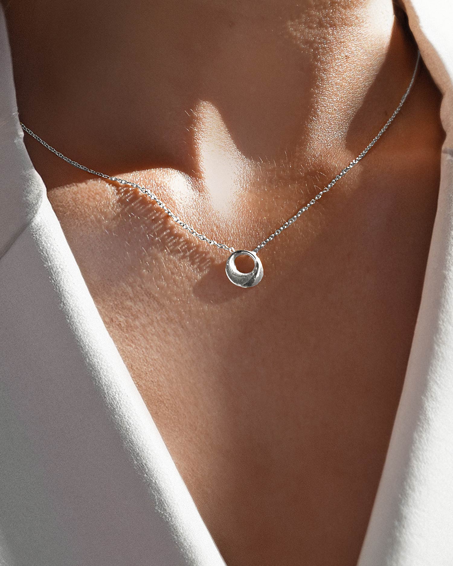 Orbit drop necklace silver