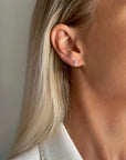 Le Knot flat drop studs silver